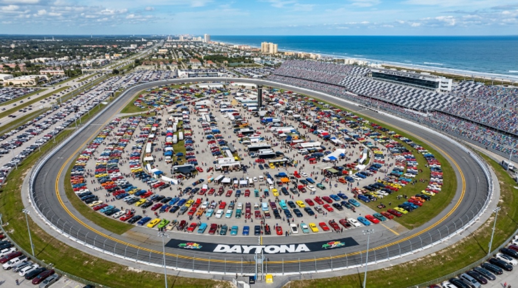 Aerial view of Daytona International Speedway filled with show vehicles and crowds during the Thanksgiving weekend Turkey Run